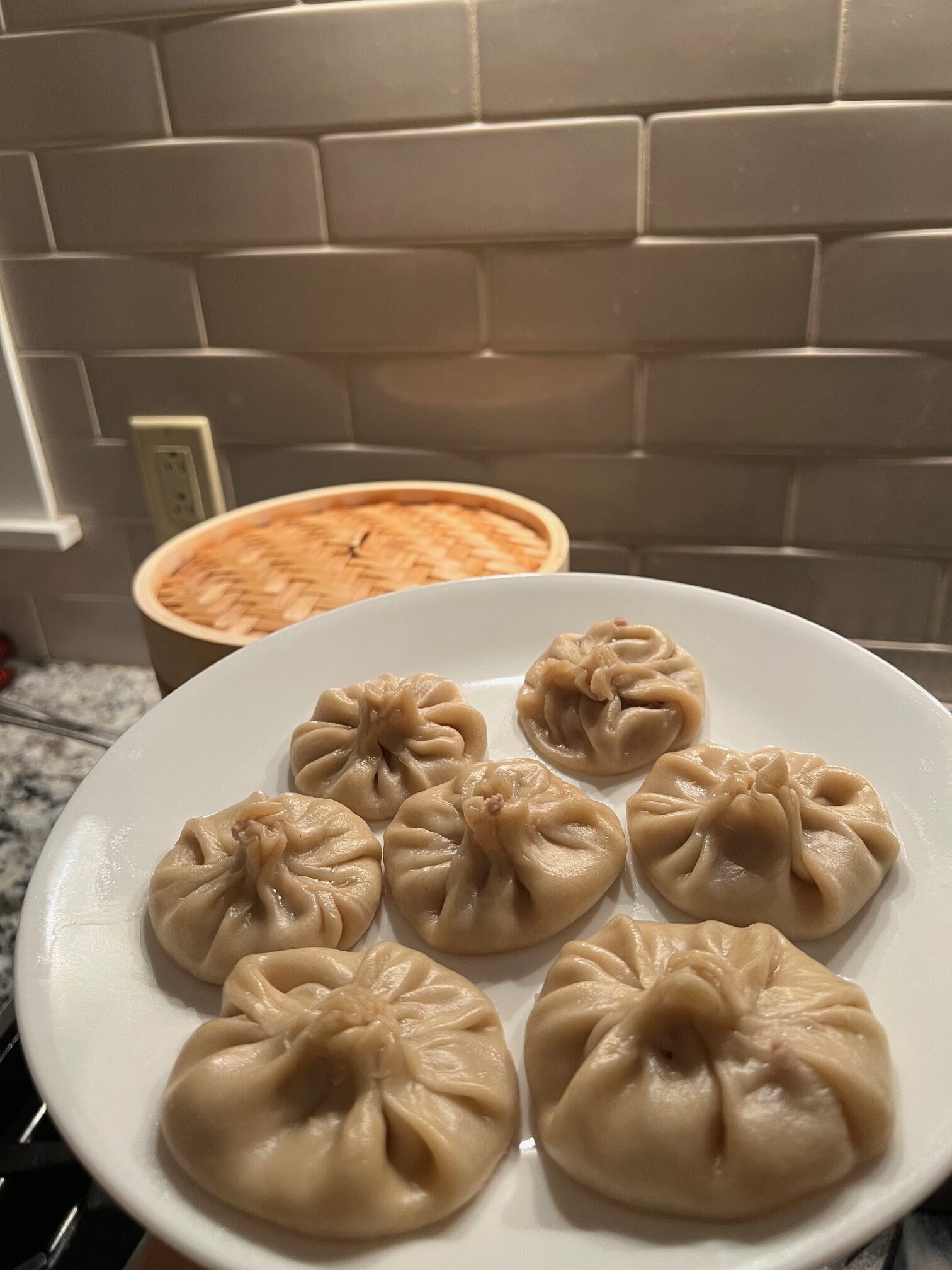 Soup dumplings steamed in Asian Basket