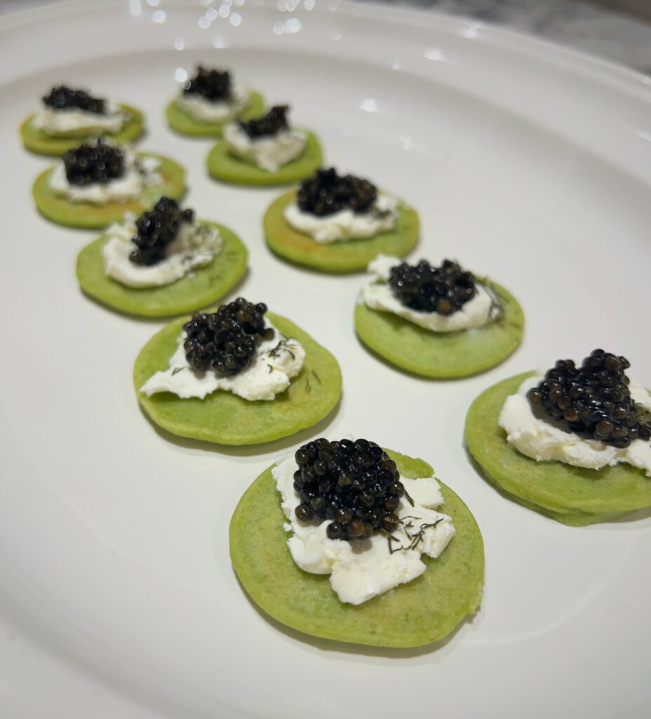 Caviar with cream cheese and basil blini